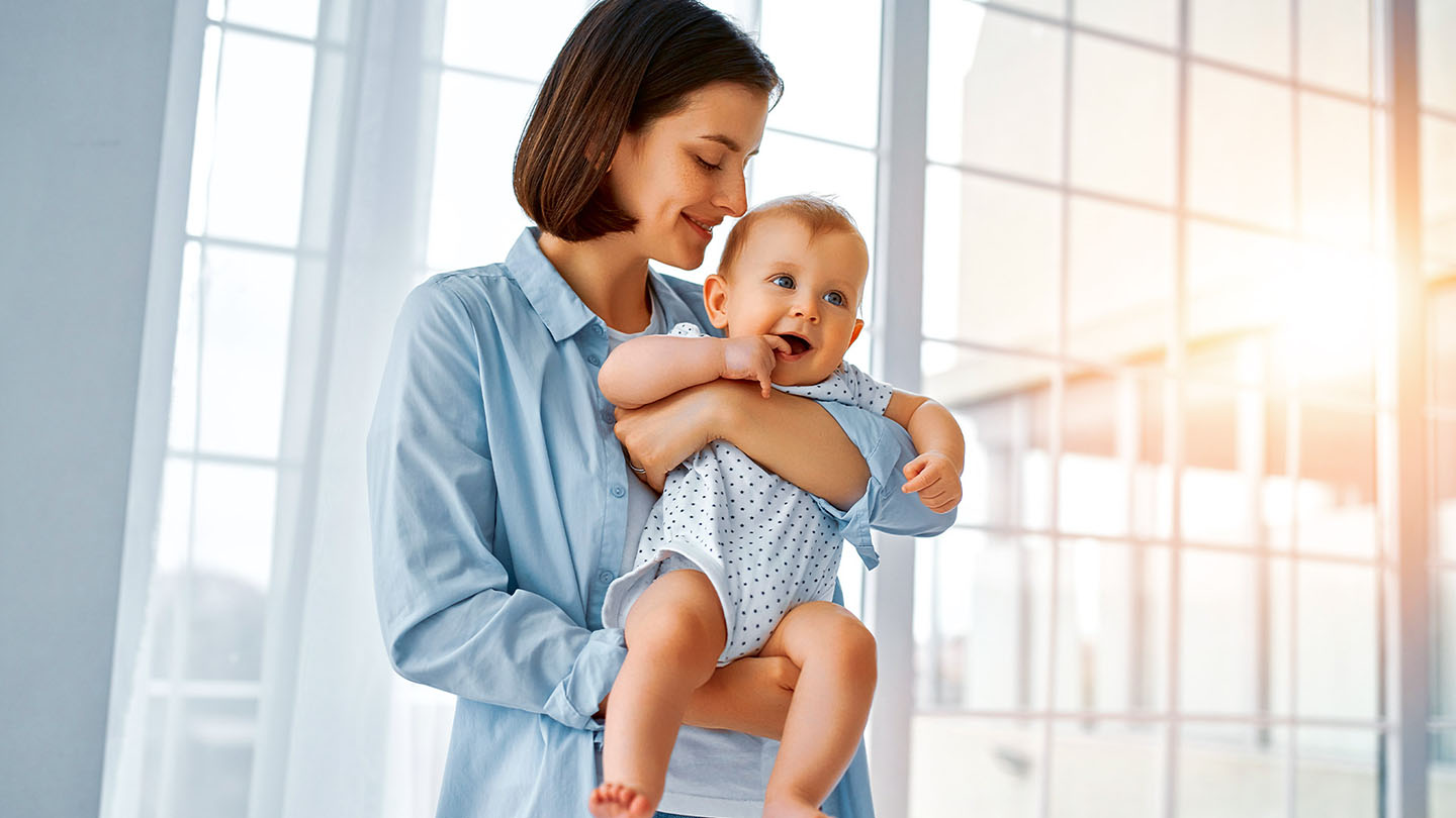 Majka sa djetetom u naručju.